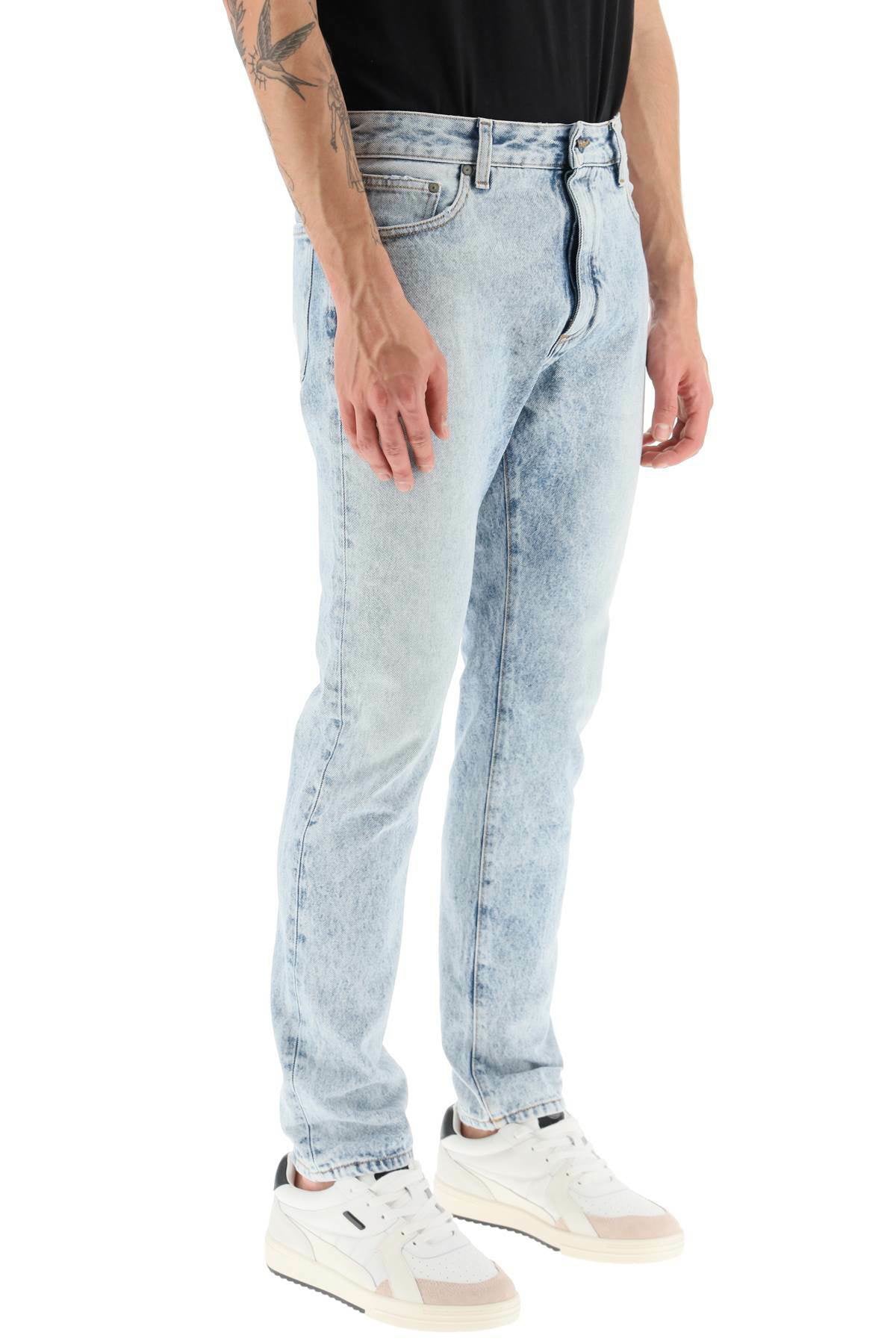 Palm Angels Back Logo Print Jeans
